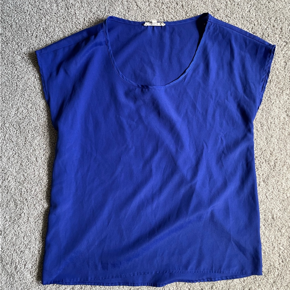 Almost sheer blue blouse from Lush. Size S